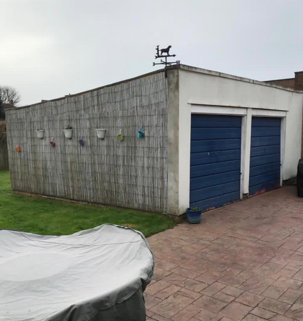 Garage pictured before removal