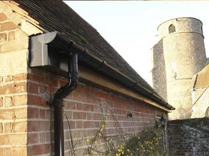 Roofline with guttering and a downpipe